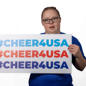 Amanda Leonard holding a Cheer 4 USA sign