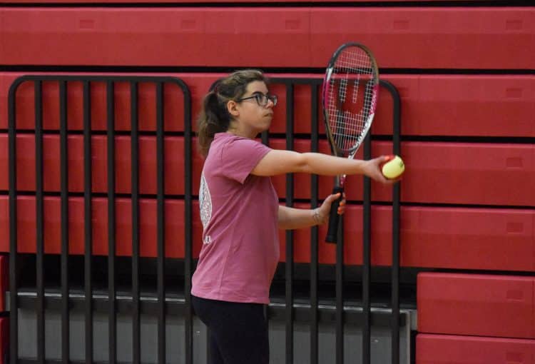 Gabriel sister playing tennis