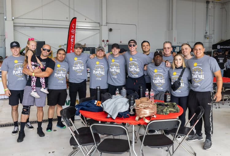 Group photo of plane pull team