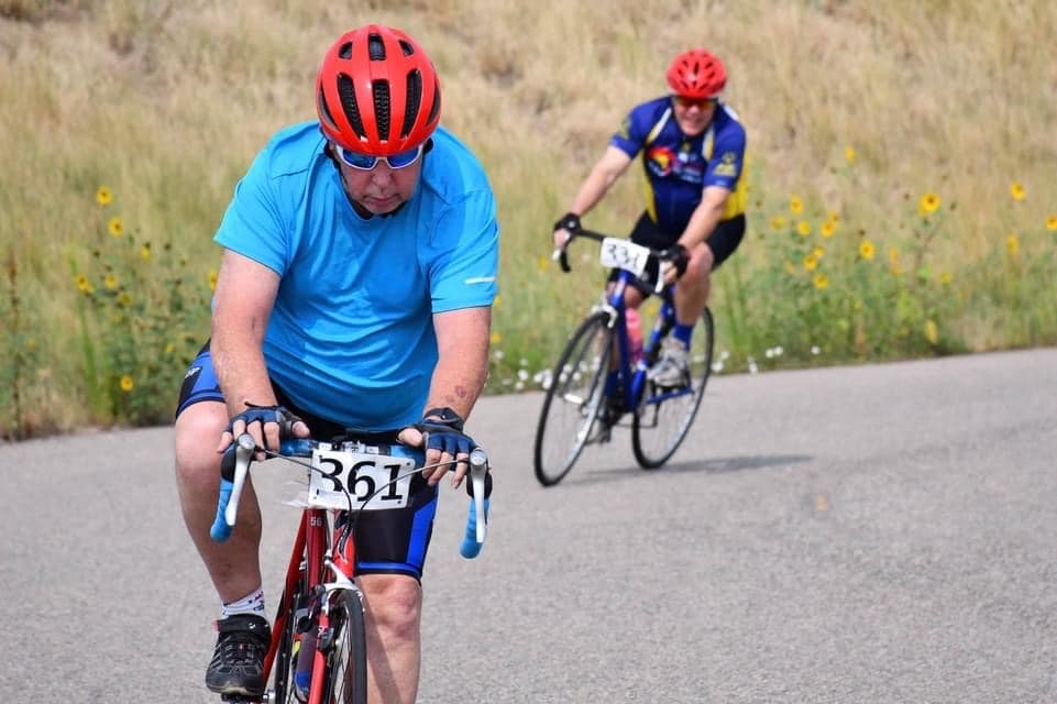 Greg mark riding a bike