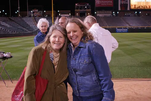 Forrest Phillips Blue Coat smiling with a friend